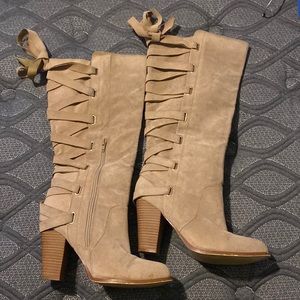 Khaki knee high boots with laces up the back